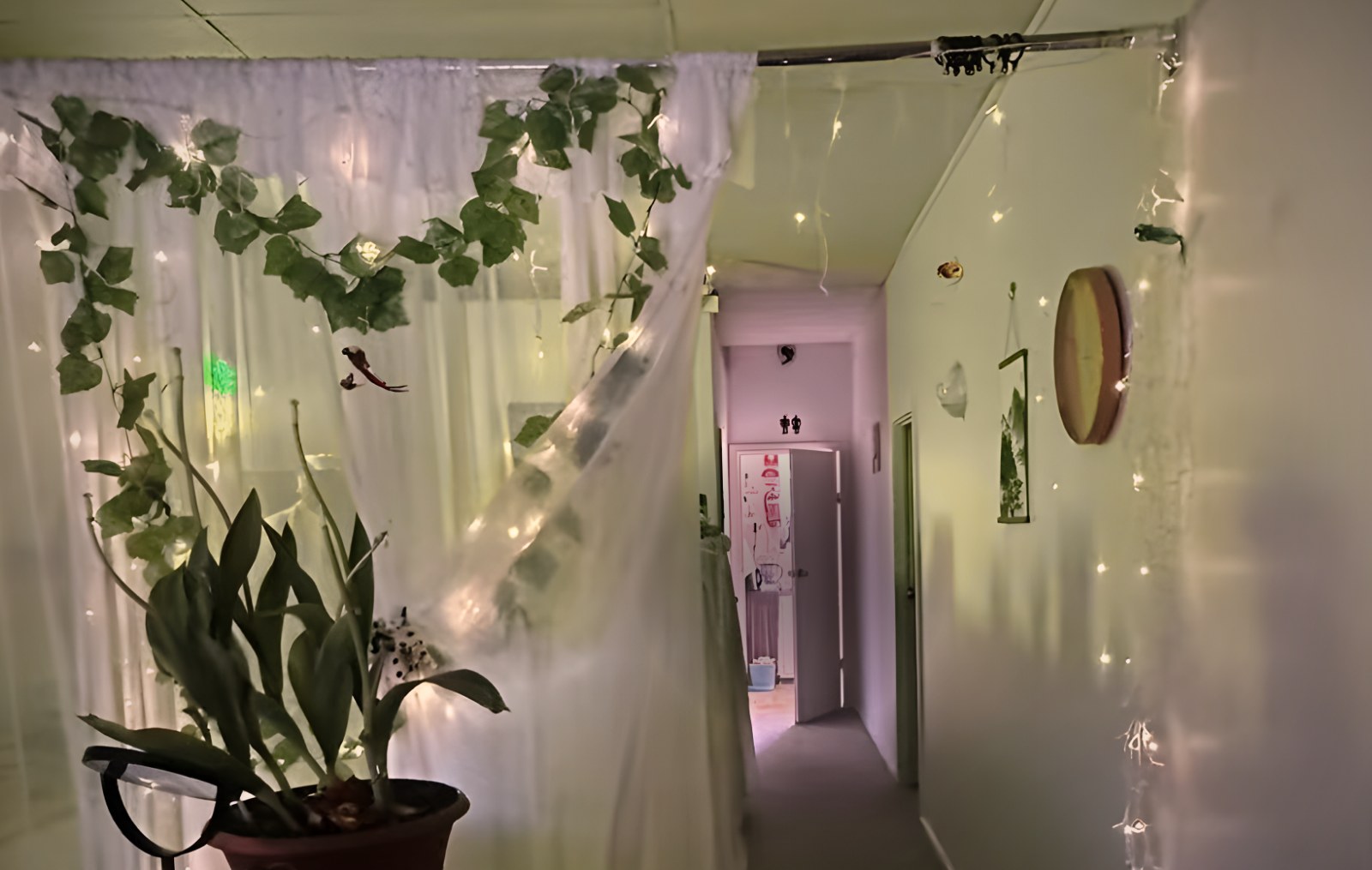 Hallway with fairy lights, ivy and an orchid